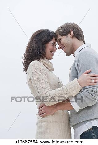 Picture - A couple outdoors. Fotosearch