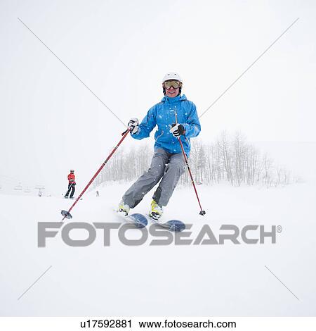 A downhill skier View Large Photo Image Stock Image - A downhill skier. Fotosearch