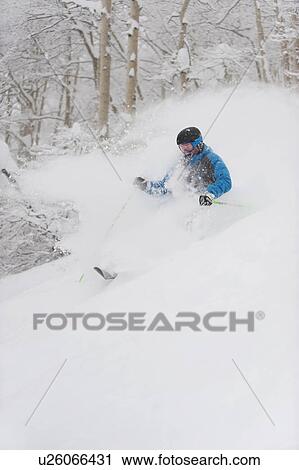 A downhill skier View Large Photo Image Stock Image - A downhill skier. Fotosearch