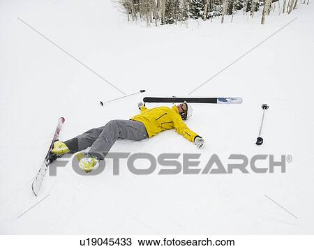 Stock Image - A downhill skier who fell. Fotosearch