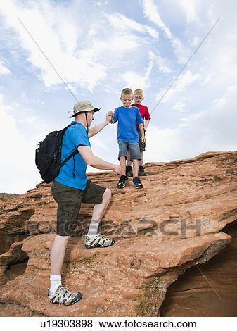 A father and two sons at Red Rock View Large Photo Image Stock Photo - A father and two sons at Red Rock. Fotosearch