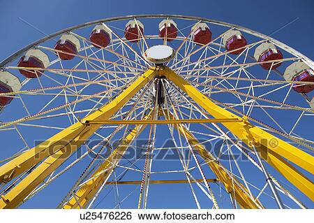 A ferris wheel ride View Large Photo Image Stock Photograph - A ferris wheel ride. Fotosearch