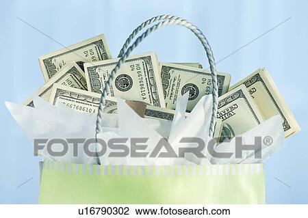 A gift bag with bank notes View Large Photo Image Stock Image - A gift bag with bank notes. Fotosearch