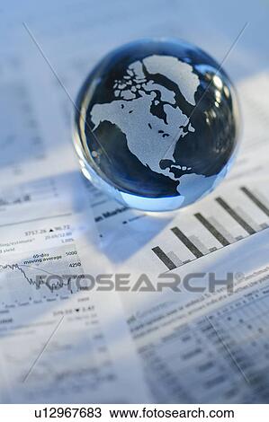 A globe on business papers View Large Photo Image Stock Image - A globe on business papers. Fotosearch