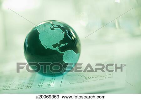 A globe on business papers View Large Photo Image Stock Photo - A globe on business papers. Fotosearch