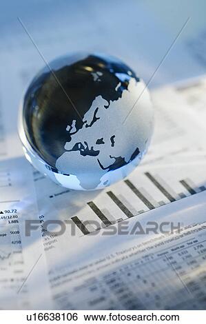 A globe on business papers View Large Photo Image Stock Photograph - A globe on business papers. Fotosearch