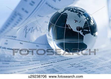 A globe on business papers View Large Photo Image Stock Photograph - A globe on business papers. Fotosearch