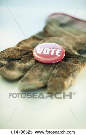 A glove with a Vote button on it View Large Photo Image Stock Photography - A glove with a Vote button on it. Fotosearch