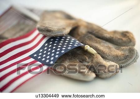A glove with an American flag View Large Photo Image Stock Photo - A glove with an American flag. Fotosearch