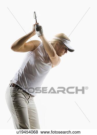 Stock Photo - A golfer. Fotosearch