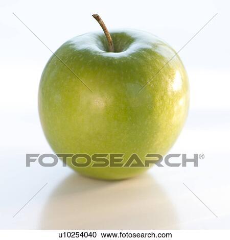 A green apple View Large Photo Image Stock Image - A green apple. Fotosearch