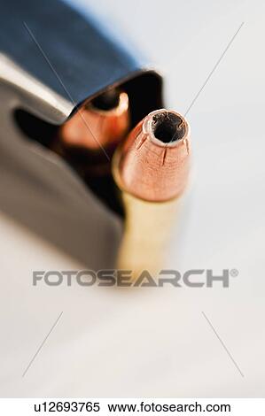 A gun clip with ammunition View Large Photo Image Stock Photography - A gun clip with ammunition. Fotosearch