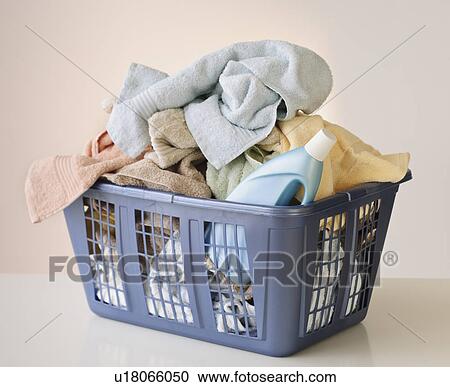 A laundry basket full of towels View Large Photo Image Stock Image - A laundry basket full of towels. Fotosearch