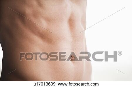 Stock Photo - A man's shirtless abdomen. Fotosearch