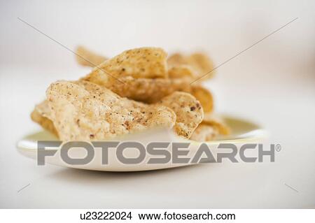 Picture - A plate of chips. Fotosearch