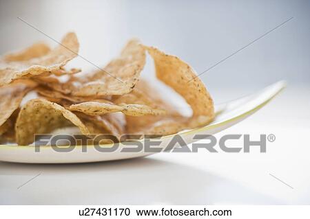A plate of chips View Large Photo Image Stock Image - A plate of chips. Fotosearch