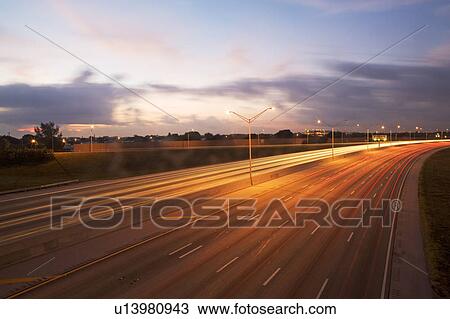 A road with tail light trails View Large Photo Image Stock Image - A road with tail light trails. Fotosearch