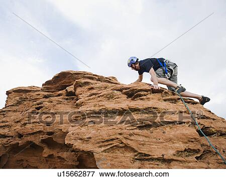 A rock climber at Red Rock View Large Photo Image Stock Photo - A rock climber at Red Rock. Fotosearch