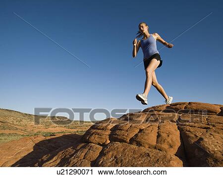 Stock Image - A runner at Red Rock. Fotosearch