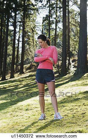 A runner in the woods View Large Photo Image Stock Image - A runner in the woods. Fotosearch