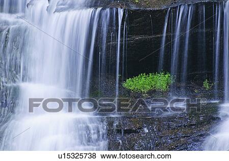 A scenic waterfall View Large Photo Image Stock Photo - A scenic waterfall. Fotosearch