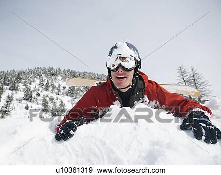 A snowboarder falling View Large Photo Image Stock Photo - A snowboarder falling. Fotosearch