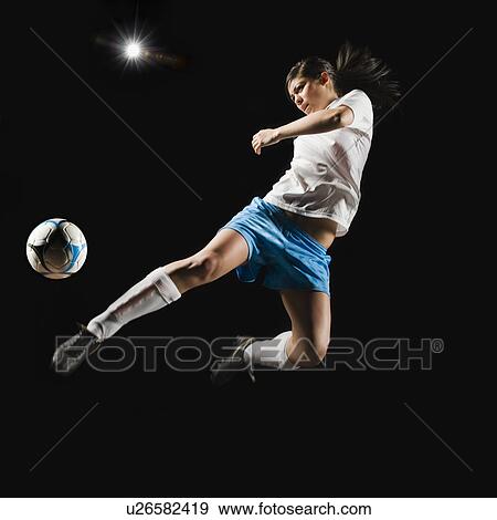 Stock Photo - A soccer player. Fotosearch