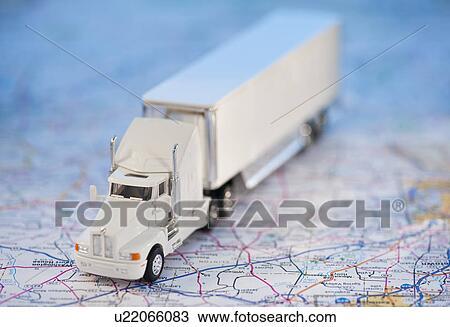 A toy truck on a map View Large Photo Image Stock Image - A toy truck on a map. Fotosearch