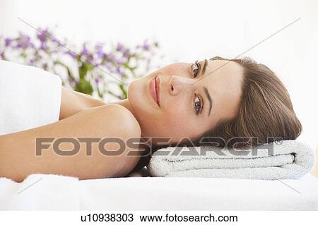 Stock Image - A woman at a spa. Fotosearch