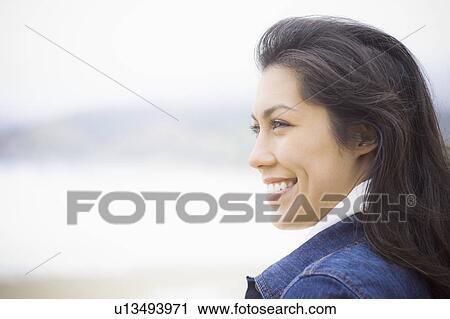 A woman at the beach View Large Photo Image Stock Image - A woman at the beach. Fotosearch