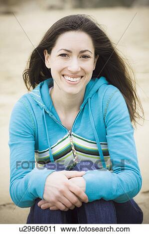 A woman at the beach View Large Photo Image Stock Image - A woman at the beach. Fotosearch
