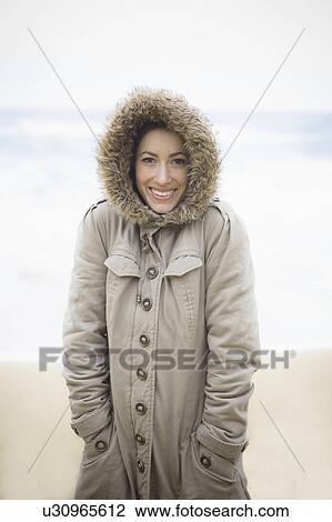 A woman at the beach View Large Photo Image Stock Image - A woman at the beach. Fotosearch