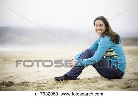 A woman at the beach View Large Photo Image Stock Photo - A woman at the beach. Fotosearch