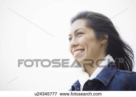 A woman at the beach View Large Photo Image Stock Photo - A woman at the beach. Fotosearch