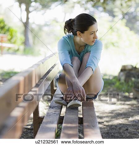 A woman in the park View Large Photo Image Stock Image - A woman in the park. Fotosearch