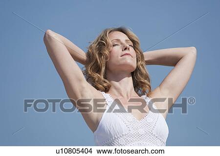 A woman outdoors View Large Photo Image Picture - A woman outdoors. Fotosearch