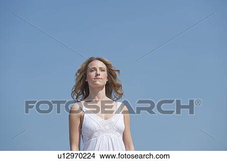 A woman outdoors View Large Photo Image Picture - A woman outdoors. Fotosearch