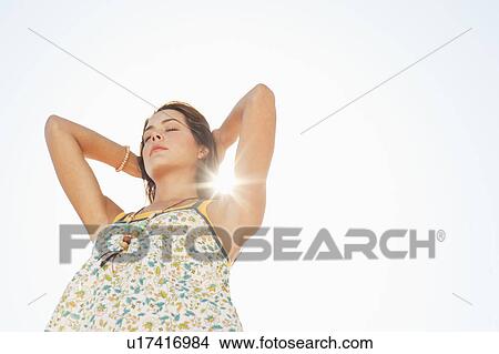 A woman outdoors View Large Photo Image Picture - A woman outdoors. Fotosearch