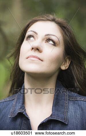 A woman outdoors View Large Photo Image Stock Image - A woman outdoors. Fotosearch