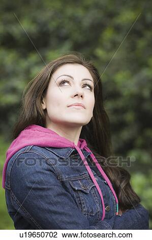 A woman outdoors View Large Photo Image Stock Image - A woman outdoors. Fotosearch