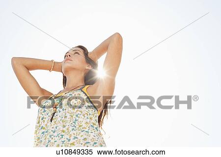 A woman outdoors View Large Photo Image Stock Photography - A woman outdoors. Fotosearch