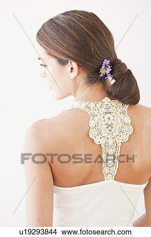 Picture - A woman with her back to camera. Fotosearch