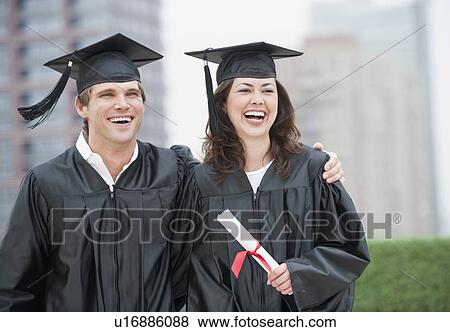 A young woman and young man graduating View Large Photo Image Stock Photo - A young woman and young man graduating. Fotosearch