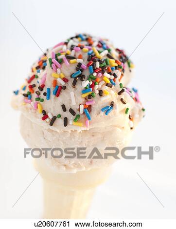 An ice cream cone with sprinkles View Large Photo Image Stock Image - An ice cream cone with sprinkles. Fotosearch