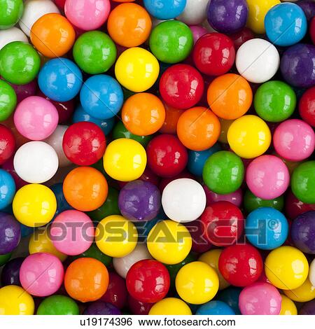 Stock Photograph - Assorted colors of candy. Fotosearch