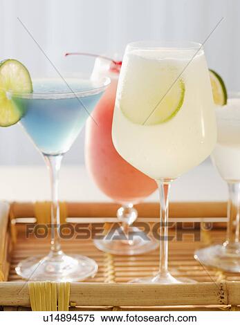 Assorted tropical cocktails View Large Photo Image Stock Photography - Assorted tropical cocktails. Fotosearch