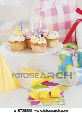 Birthday decorations and cupcakes View Large Photo Image Stock Photo - Birthday decorations and cupcakes. Fotosearch