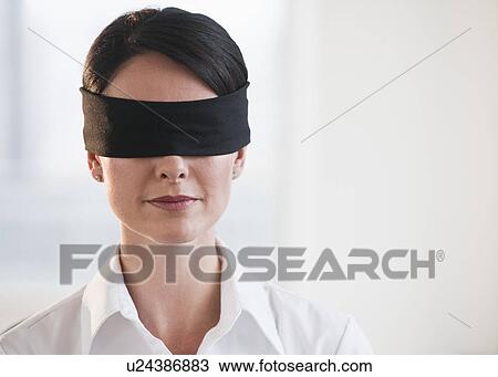 Businesswoman wearing blindfold View Large Photo Image Stock Image - Businesswoman wearing blindfold. Fotosearch