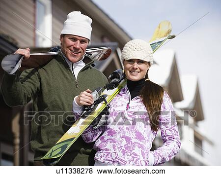 Couple on ski vacation View Large Photo Image Stock Photo - Couple on ski vacation. Fotosearch