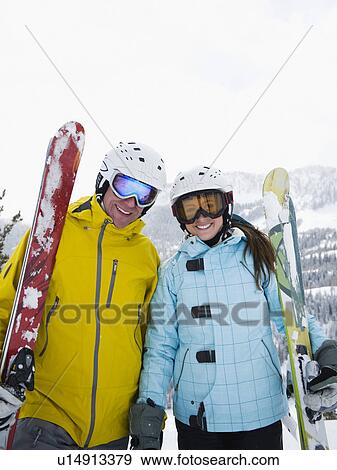 Couple on ski vacation View Large Photo Image Stock Photo - Couple on ski vacation. Fotosearch